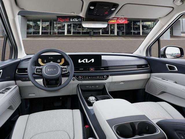 Photo of 2026 Snow White Pearl Kia Carnival Hybrid
