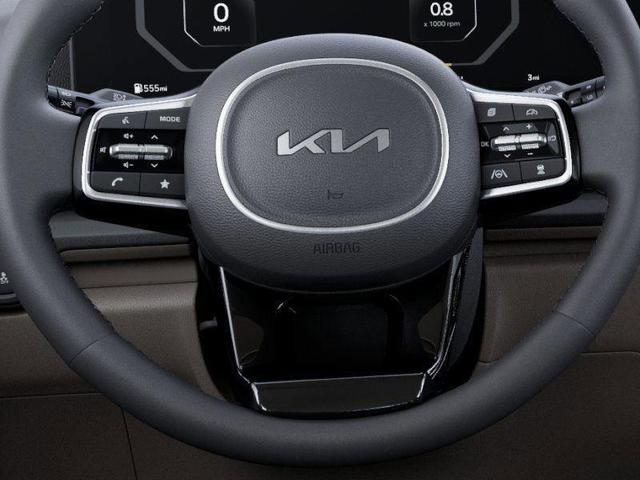 Photo of 2026 Astra Blue Kia Carnival Hybrid
