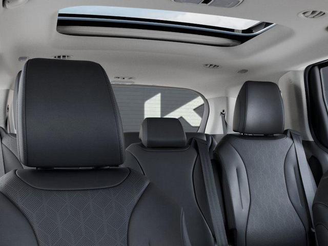 Photo of 2026 Astra Blue Kia Carnival Hybrid