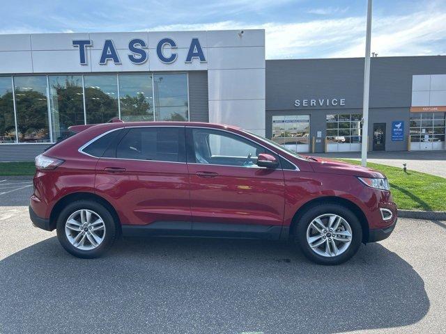 Photo of 2016 Ruby Red Metallic Tinted Clearcoat Ford Edge