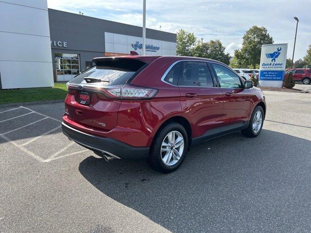 Photo of 2016 Ruby Red Metallic Tinted Clearcoat Ford Edge