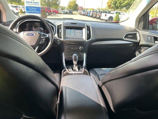 Photo of 2016 Ruby Red Metallic Tinted Clearcoat Ford Edge