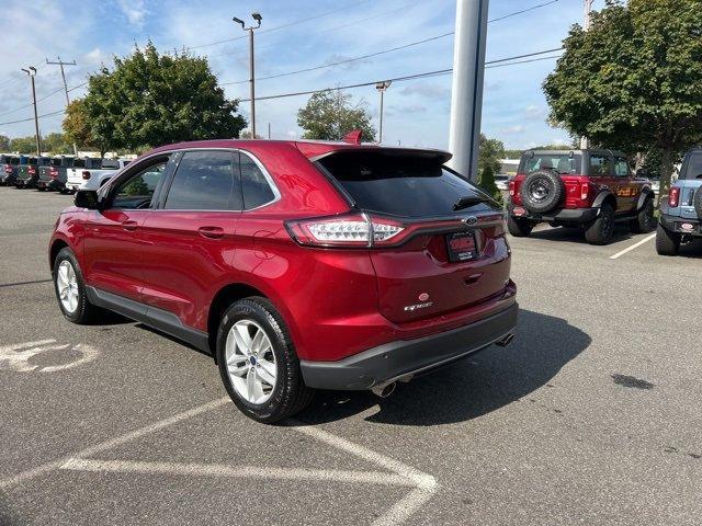Photo of 2016 Ruby Red Metallic Tinted Clearcoat Ford Edge