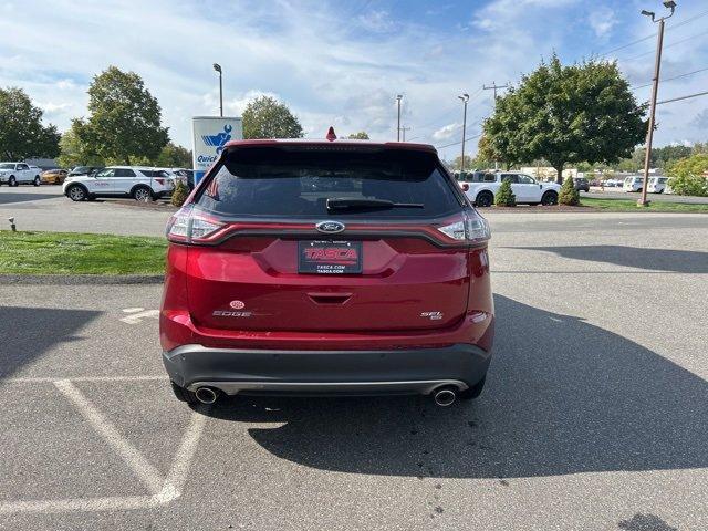 Photo of 2016 Ruby Red Metallic Tinted Clearcoat Ford Edge