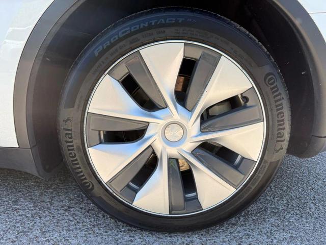 Photo of 2022 Pearl White Multi-Coat Tesla Model Y