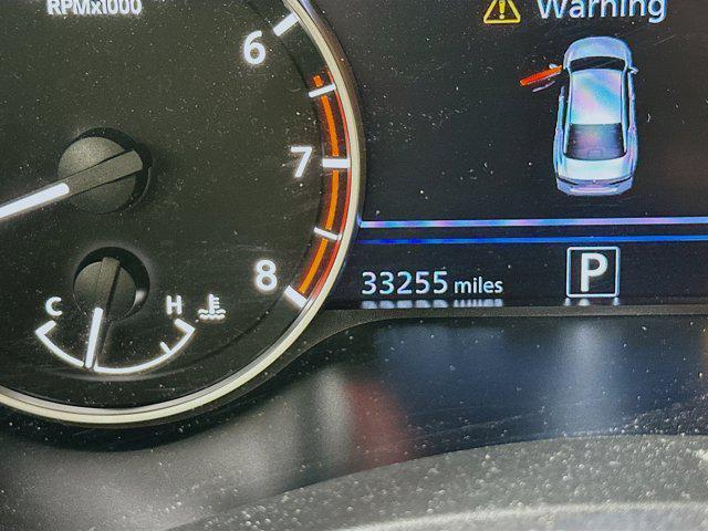 Photo of 2022 Pearl White Tricoat Nissan Altima