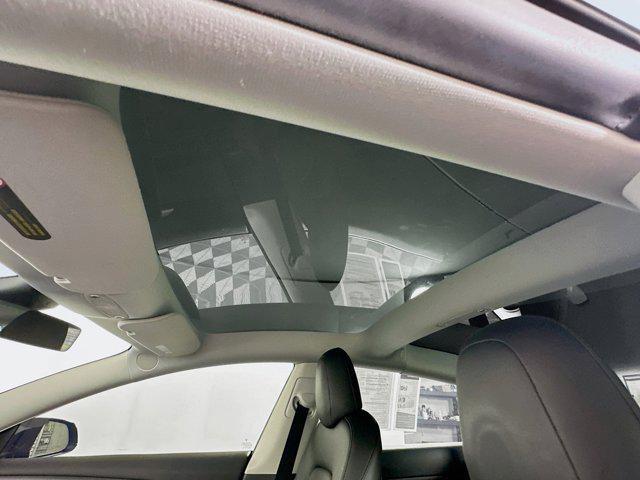Photo of 2022 Solid Black Tesla Model 3