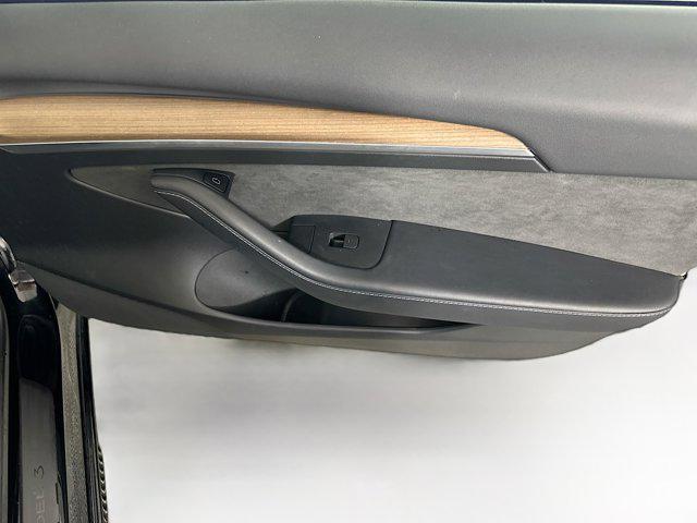 Photo of 2022 Solid Black Tesla Model 3