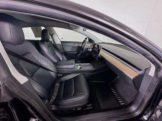 Photo of 2022 Solid Black Tesla Model 3