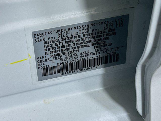 Photo of 2024 Aspen White Tricoat Nissan Sentra