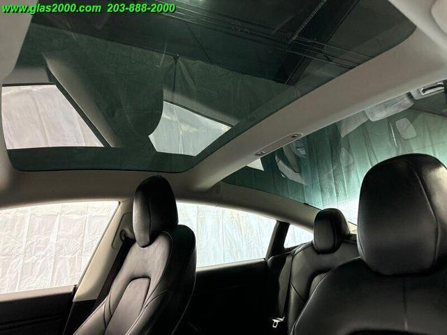 Photo of 2018 Deep Blue Metallic Tesla Model 3