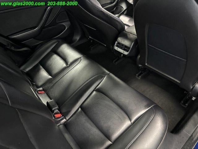 Photo of 2018 Deep Blue Metallic Tesla Model 3