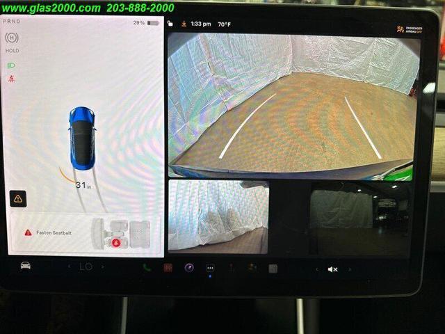 Photo of 2018 Deep Blue Metallic Tesla Model 3