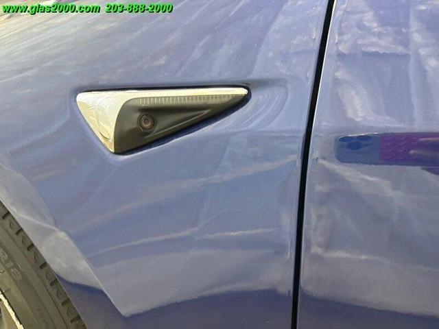 Photo of 2018 Deep Blue Metallic Tesla Model 3