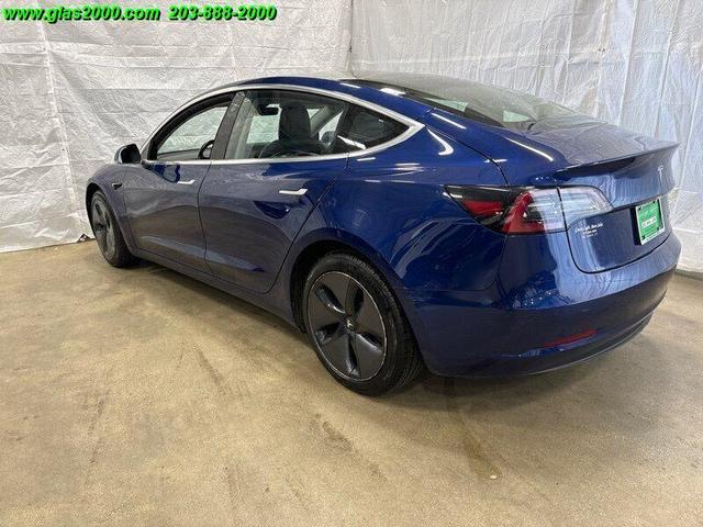 Photo of 2018 Deep Blue Metallic Tesla Model 3