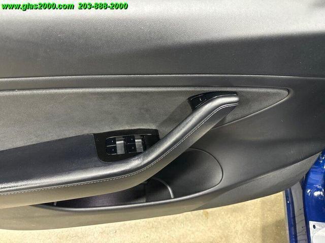 Photo of 2018 Deep Blue Metallic Tesla Model 3
