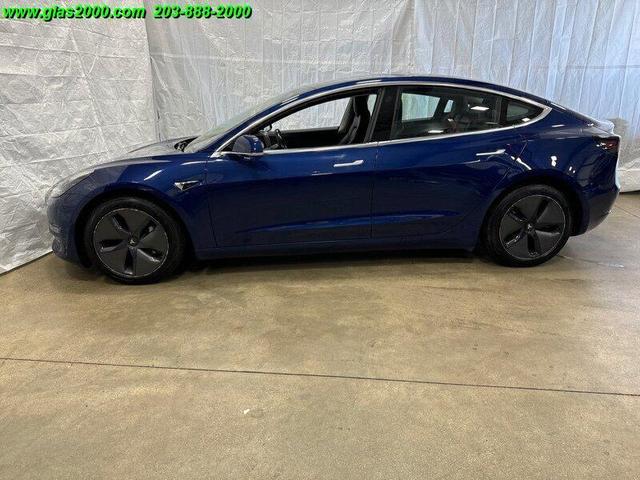 Photo of 2018 Deep Blue Metallic Tesla Model 3