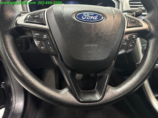 Photo of 2019 Agate Black Ford Fusion Hybrid