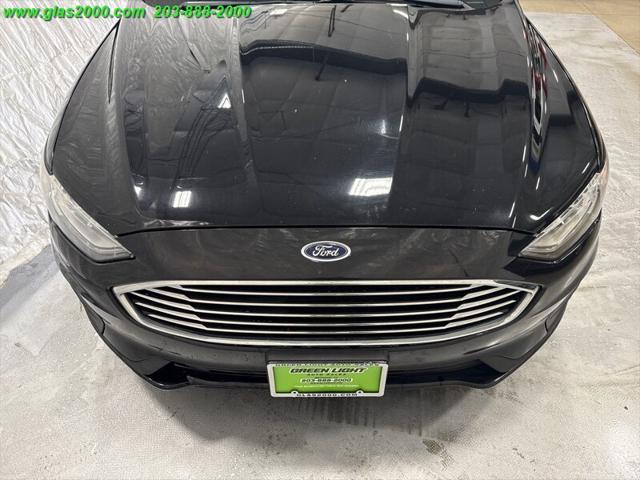 Photo of 2019 Agate Black Ford Fusion Hybrid
