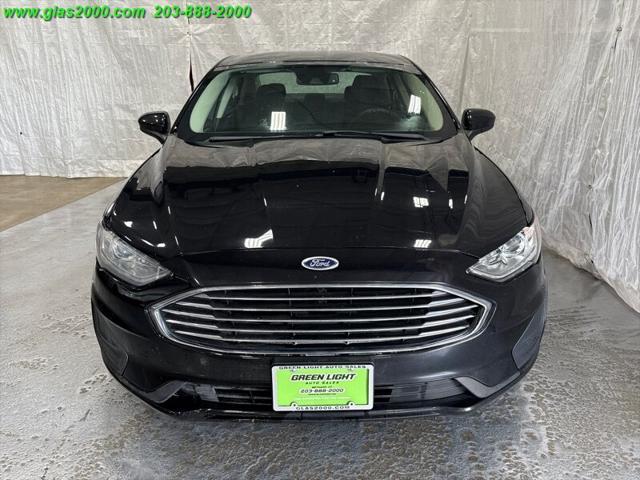 Photo of 2019 Agate Black Ford Fusion Hybrid