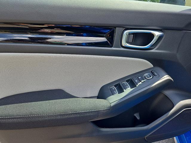 Photo of 2025 Boost Blue Pearl Honda Civic Hybrid