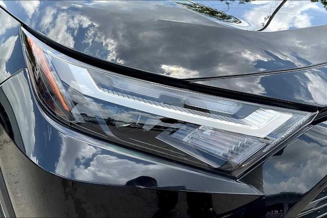 Photo of 2025 Midnight Black Metallic Toyota RAV4 Hybrid