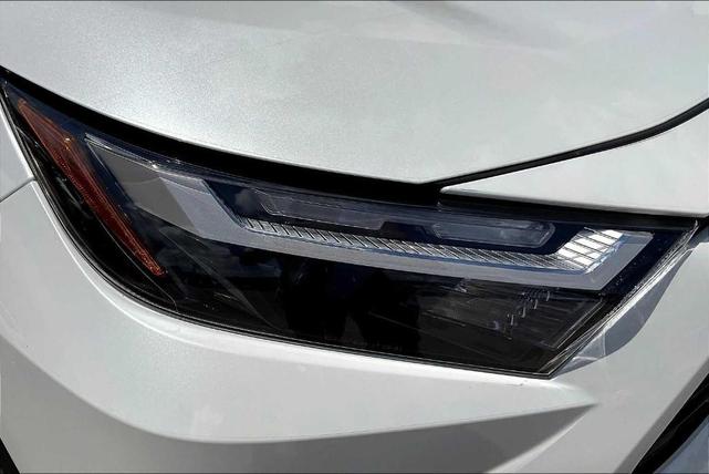 Photo of 2025 Wind Chill Pearl Toyota RAV4 Hybrid
