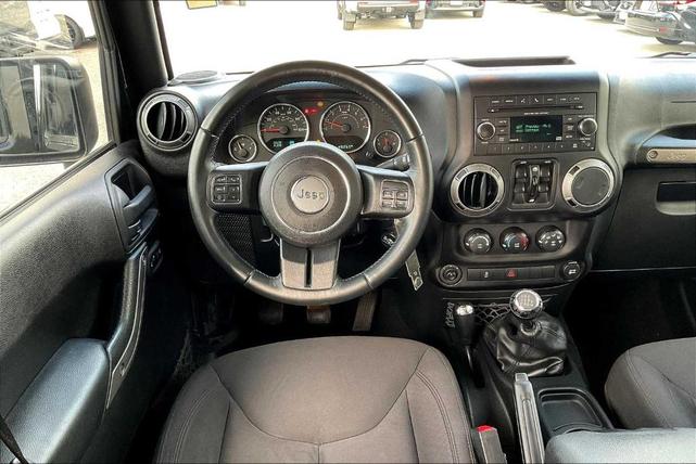 Photo of 2016 Black Clearcoat Jeep Wrangler Unlimited