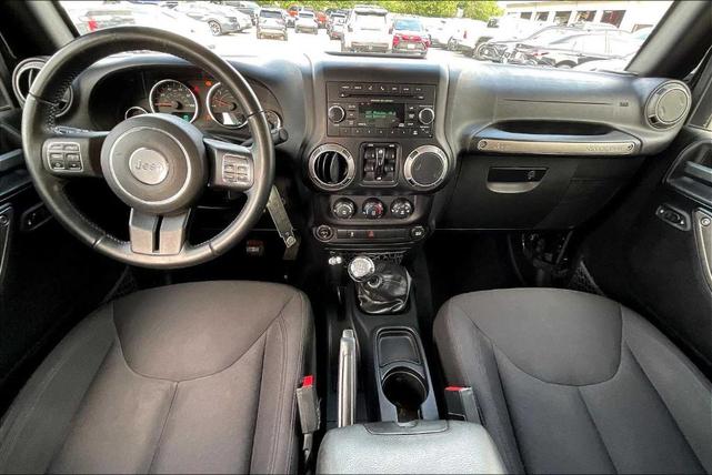 Photo of 2016 Black Clearcoat Jeep Wrangler Unlimited