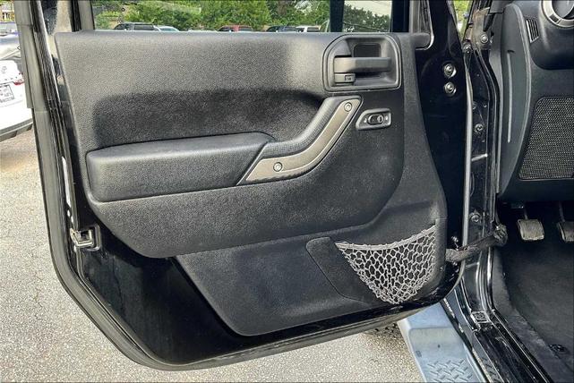 Photo of 2016 Black Clearcoat Jeep Wrangler Unlimited