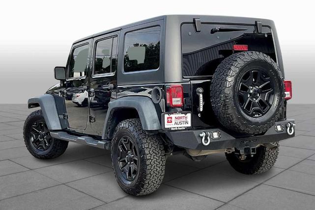Photo of 2016 Black Clearcoat Jeep Wrangler Unlimited