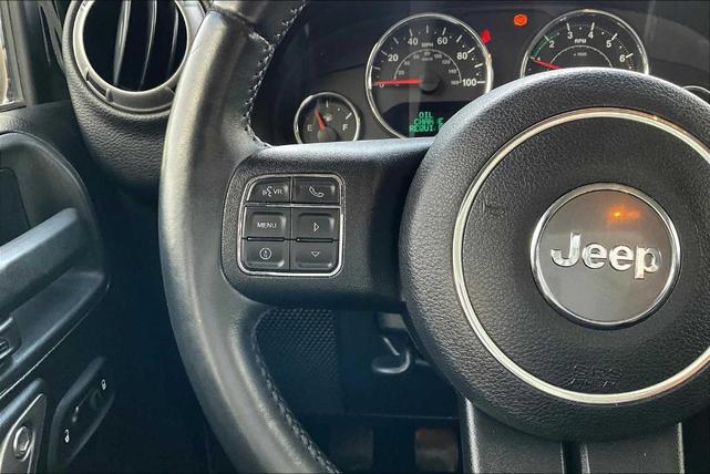 Photo of 2016 Black Clearcoat Jeep Wrangler Unlimited