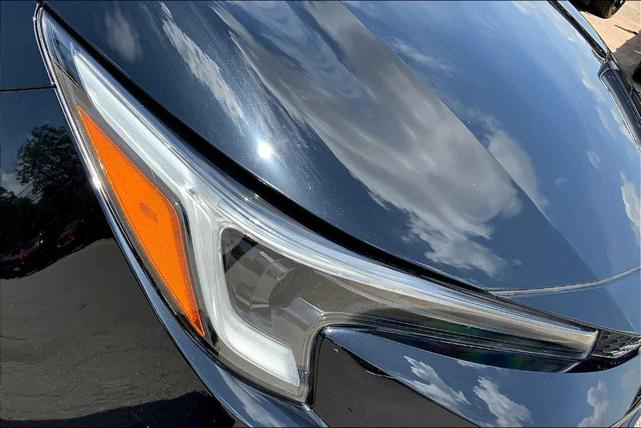 Photo of 2024 Midnight Black Metallic Toyota Corolla Hybrid