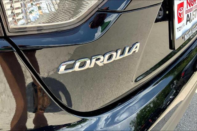 Photo of 2024 Midnight Black Metallic Toyota Corolla Hybrid