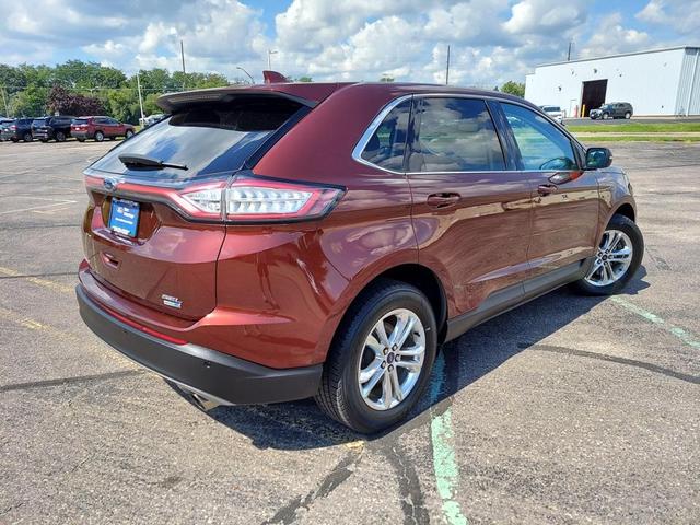 Photo of 2016 Bronze Fire Metallic Tinted Clearcoat Ford Edge