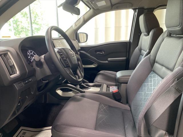 Photo of 2025 Glacier White Nissan Frontier