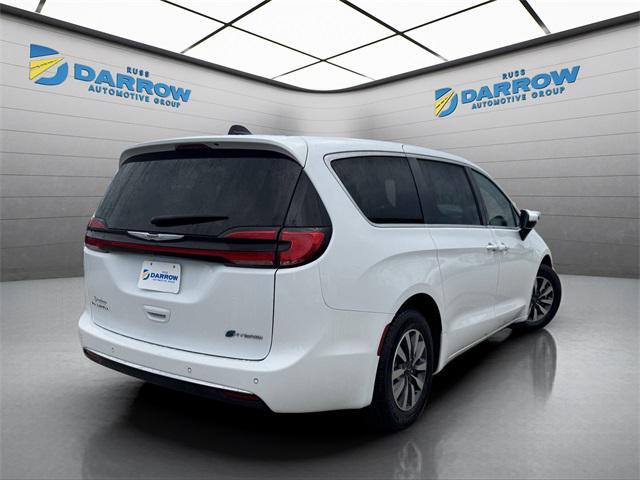 Photo of 2023 Bright White Clearcoat Chrysler Pacifica Hybrid