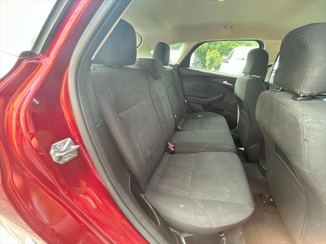 Photo of 2016 Ruby Red Metallic Tinted Clearcoat Ford Focus