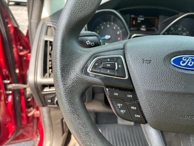 Photo of 2016 Ruby Red Metallic Tinted Clearcoat Ford Focus
