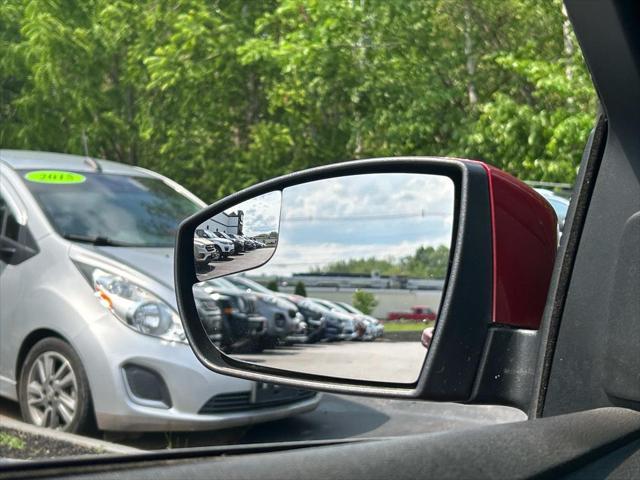 Photo of 2016 Ruby Red Metallic Tinted Clearcoat Ford Focus