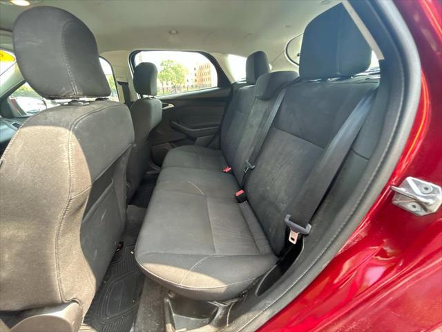 Photo of 2016 Ruby Red Metallic Tinted Clearcoat Ford Focus