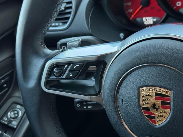 Photo of 2024 Black Porsche 718 Cayman