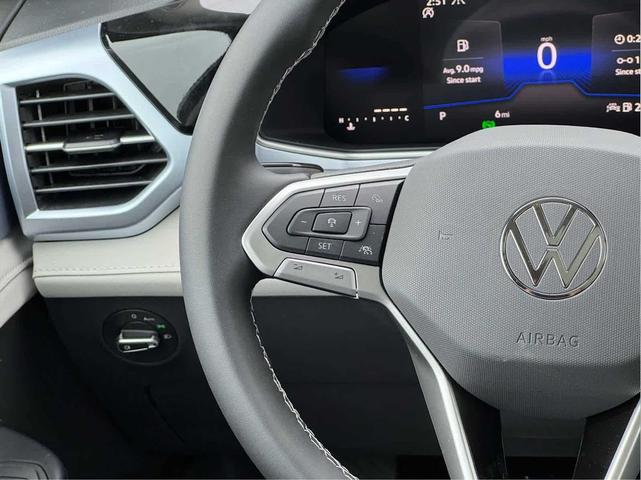 Photo of 2025 Deep Black Pearl Volkswagen Taos