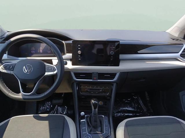 Photo of 2025 Pure White Volkswagen Taos