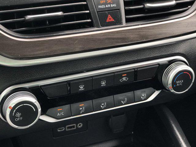 Photo of 2024 Garnet Pearl Metallic Nissan Altima