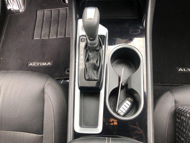 Photo of 2024 Garnet Pearl Metallic Nissan Altima