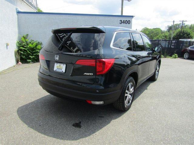 Photo of 2016 Black Forest Pearl Honda Pilot