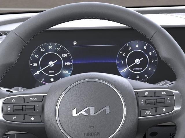 Photo of 2025 Glacier White Pearl/Ebony Black Roof Kia Sportage