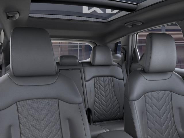 Photo of 2025 Glacier White Pearl/Ebony Black Roof Kia Sportage