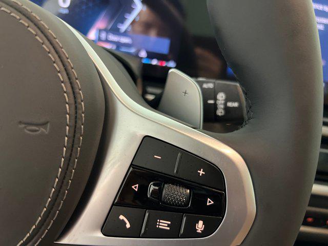 Photo of 2026 Manhattan Green Metallic BMW X5